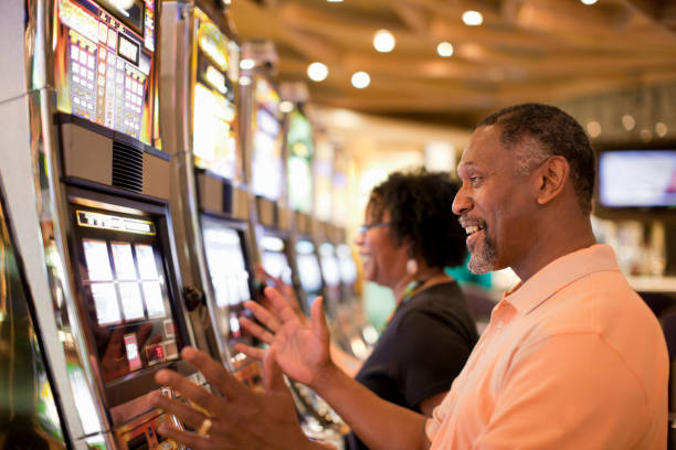 Live dealer at a Hot Pot table with card shoe and betting interface visible